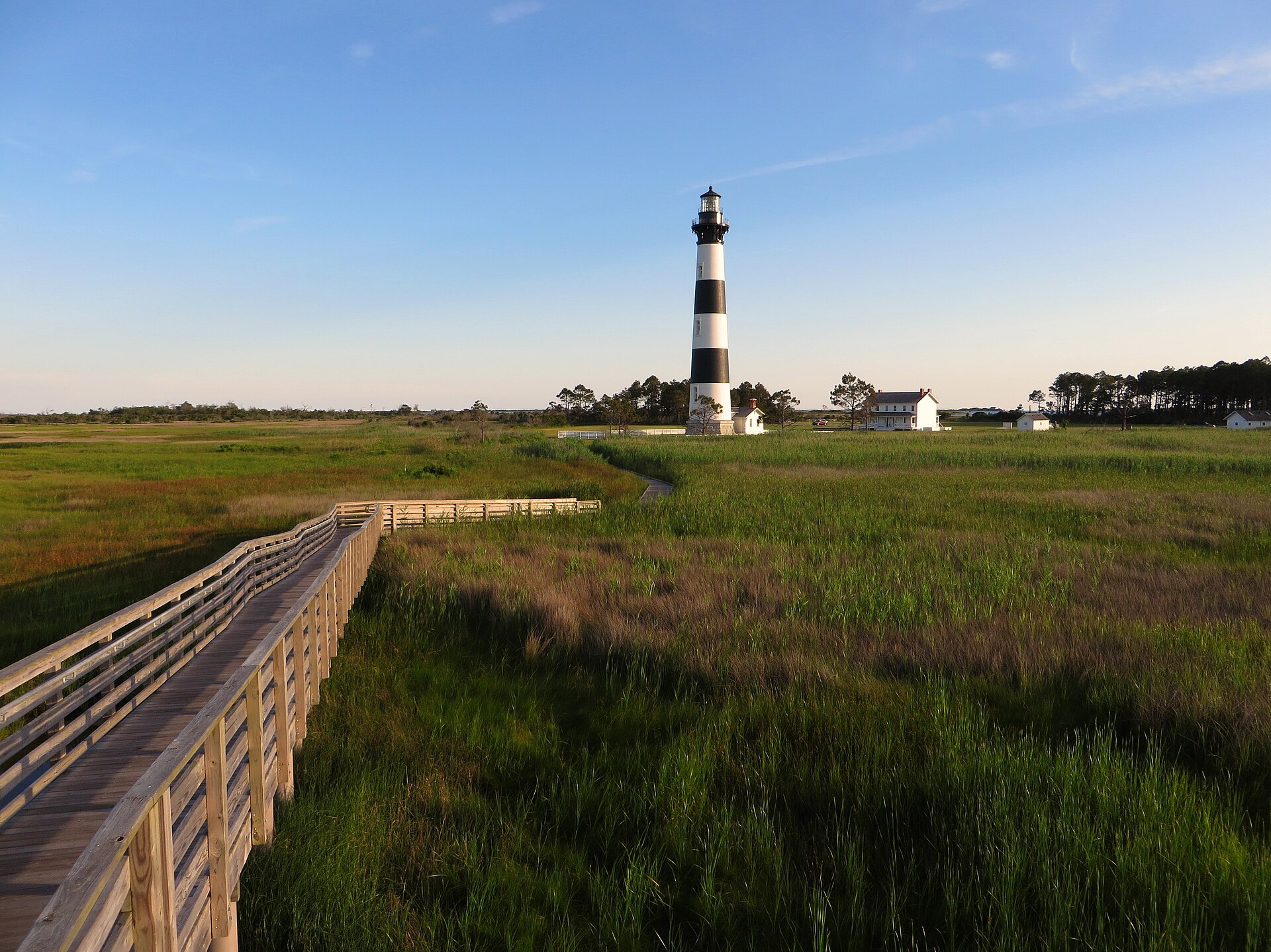 Bodie Island Lighthouse rising above the marsh boardwalk on North Carolina's Outer Banks