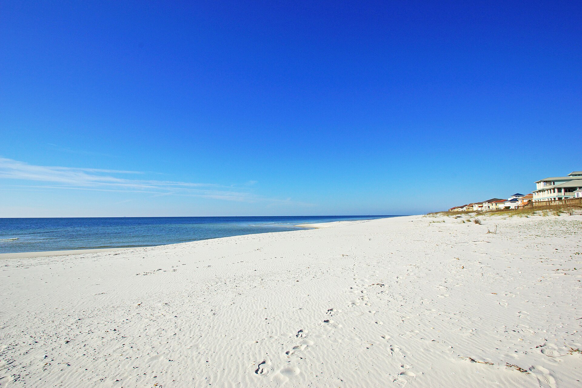White sand beach and Gulf of Mexico water at Gulf Shores, Alabama