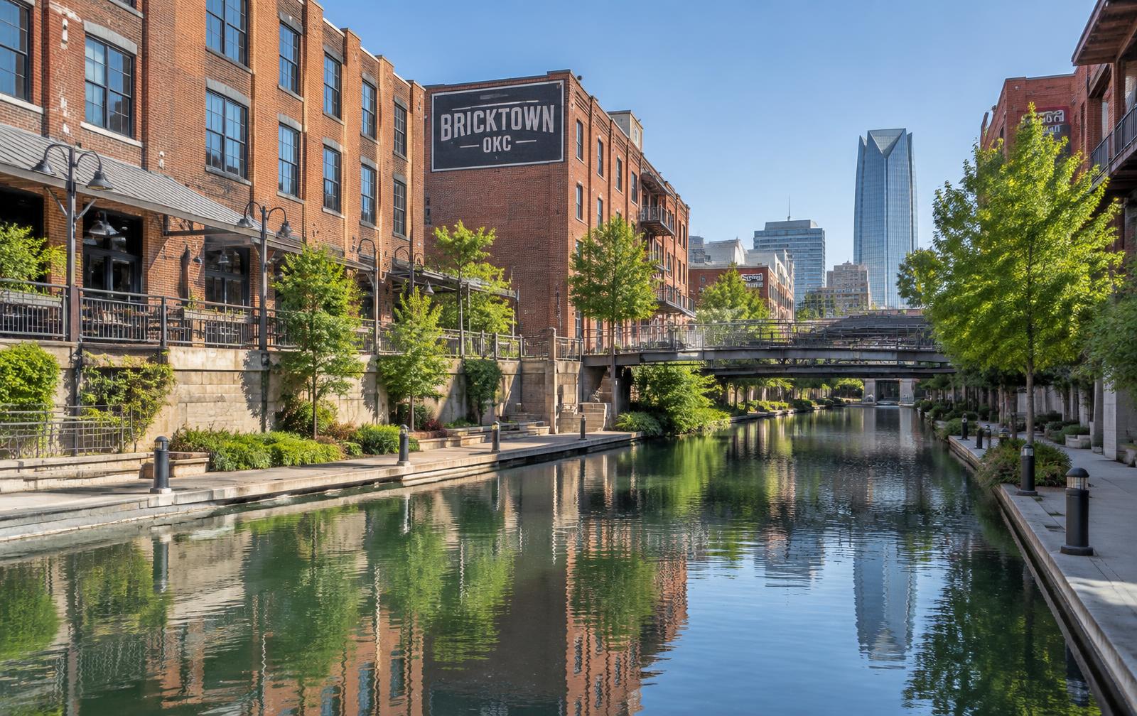 Bricktown canal and red brick warehouse buildings in Oklahoma City, Oklahoma on a bright morning
