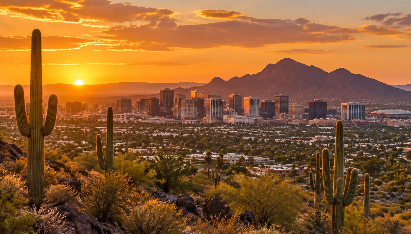 Phoenix, Arizona downtown skyline with Camelback Mountain and saguaro cactus at sunset - VA nexus letters for local veterans